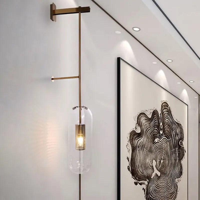 Modern gold and black orb wall lamp for living rooms