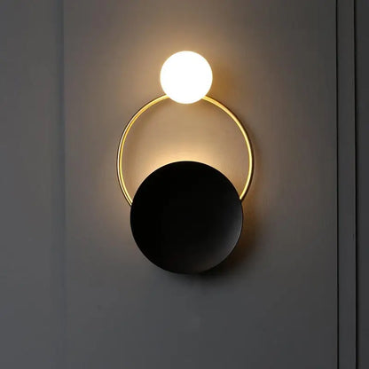 Modern gold and black orb wall lamp for living rooms