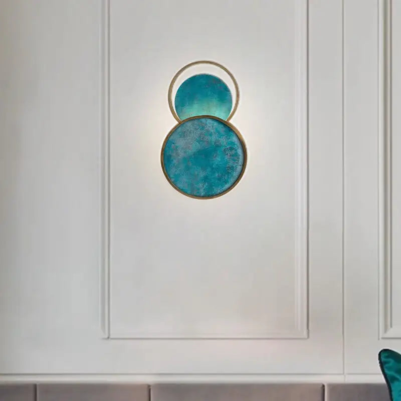Modern gold and black orb wall lamp for living rooms