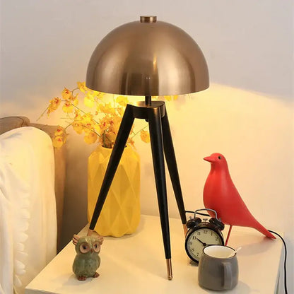 Modern gold and black tripod floor lamp living room coyote