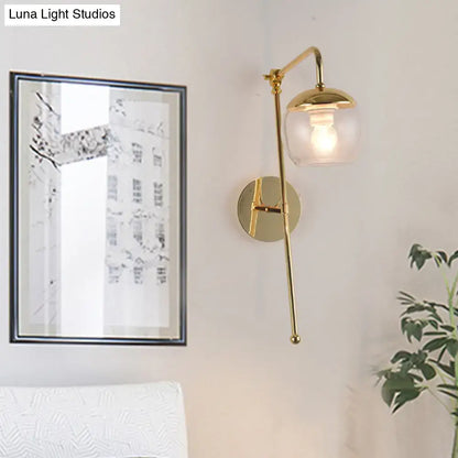 Modern gold and clear black glass ball sconce – bedroom wall light