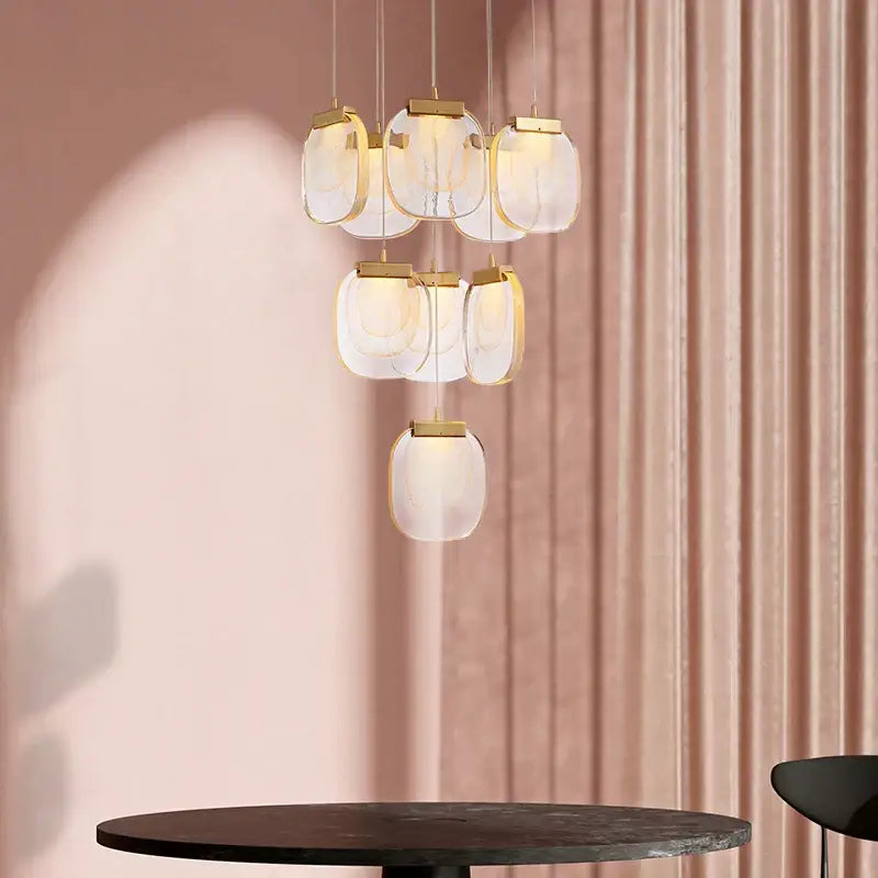 Modern gold and glass pendant lights for dining room