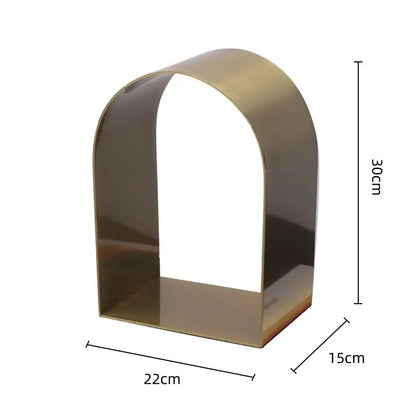 Modern gold & black golden arches metal sculpture living room bookend