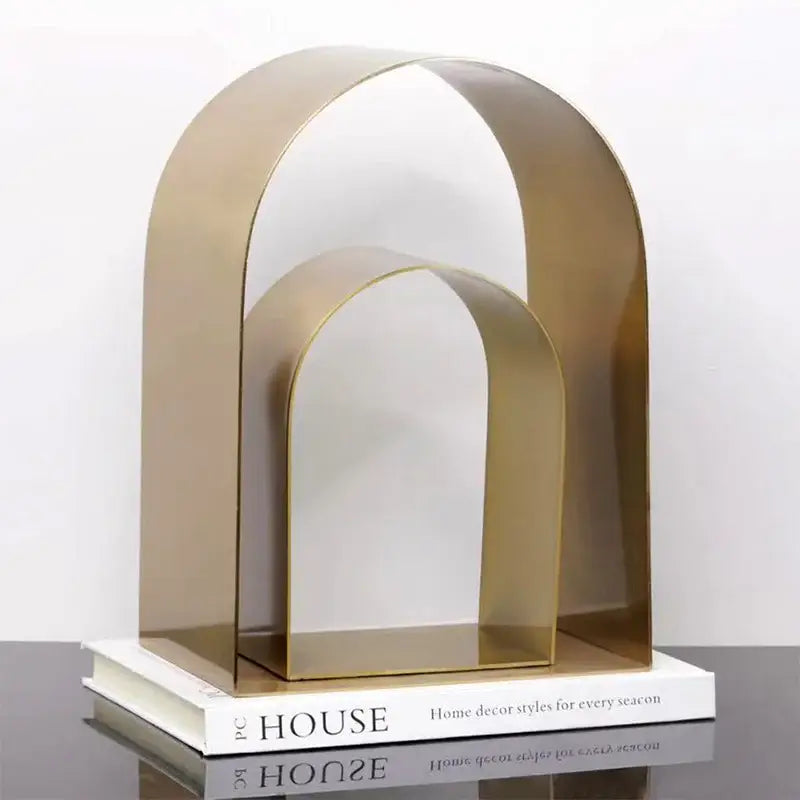 Modern gold & black golden arches metal sculpture living room bookend