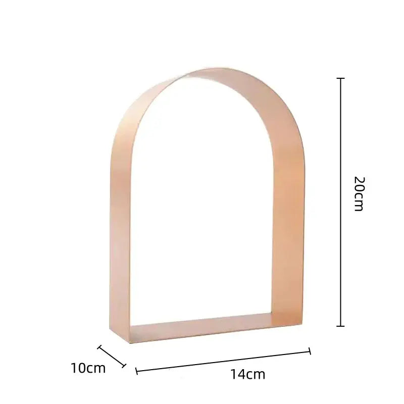 Modern gold & black golden arches metal sculpture living room bookend