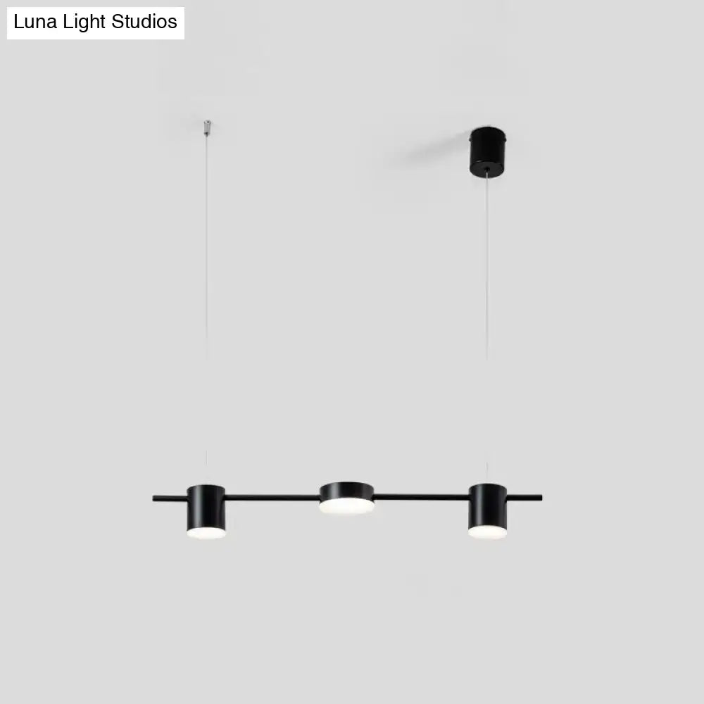 Modern gold & black linear chandelier dining room warm white light