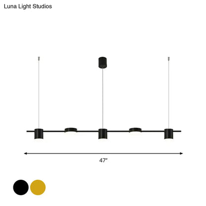 Modern gold & black linear chandelier dining room warm white light