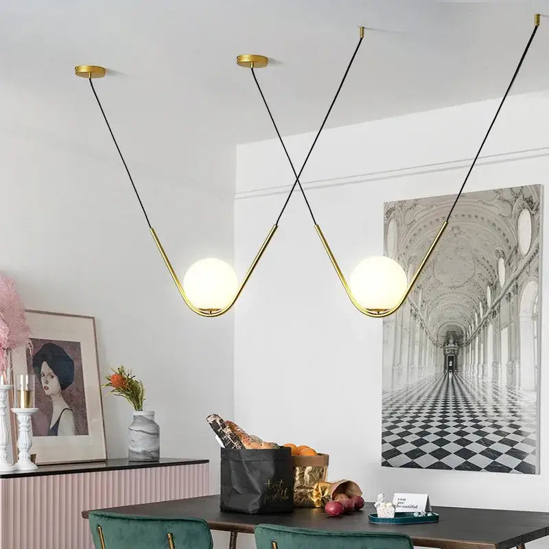 Modern gold & black pendant light dining room spherical glass trio