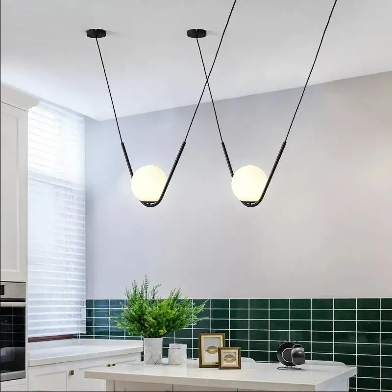 Modern gold & black pendant light dining room spherical glass trio