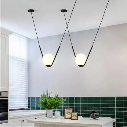 Modern gold & black pendant light dining room spherical glass trio