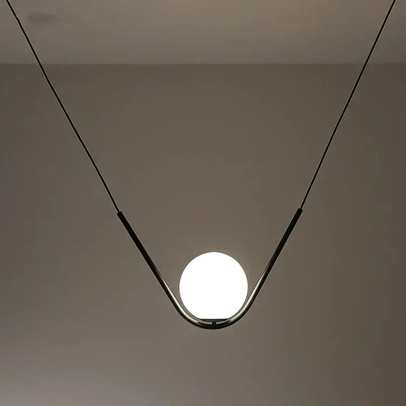 Modern gold & black pendant light dining room spherical glass trio