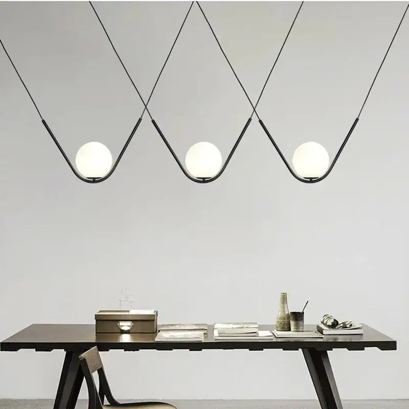 Modern gold & black pendant light dining room spherical glass trio