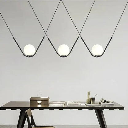 Modern gold & black pendant light dining room spherical glass trio