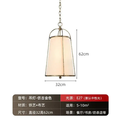 Modern gold & black pendant lights with fabric shades dining room