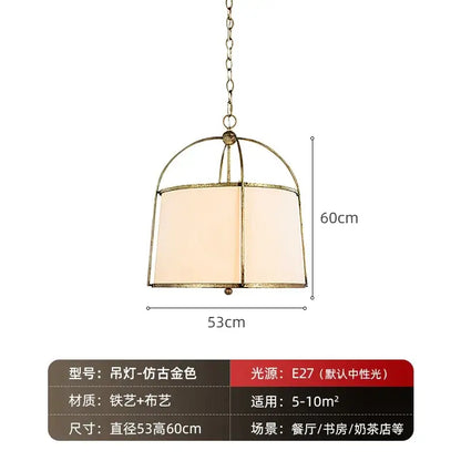 Modern gold & black pendant lights with fabric shades dining room