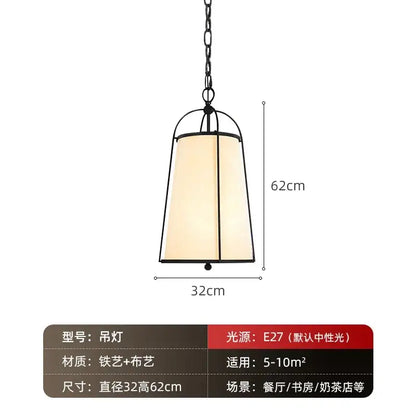 Modern gold & black pendant lights with fabric shades dining room