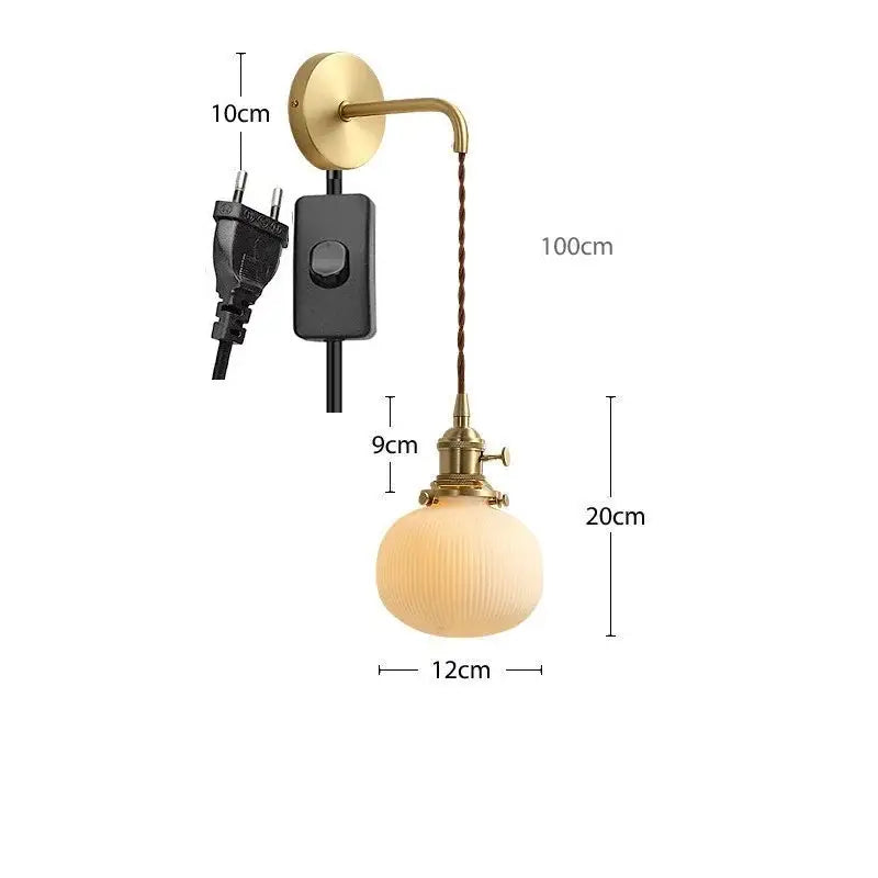 Modern gold ceramic wall lamp with ribbed shade for bedroom