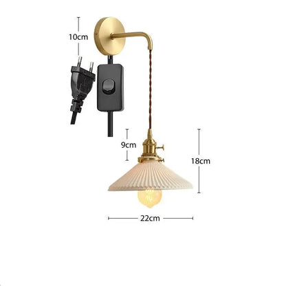 Modern gold ceramic wall lamp with ribbed shade for bedroom