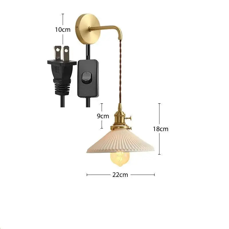 Modern gold ceramic wall lamp with ribbed shade for bedroom