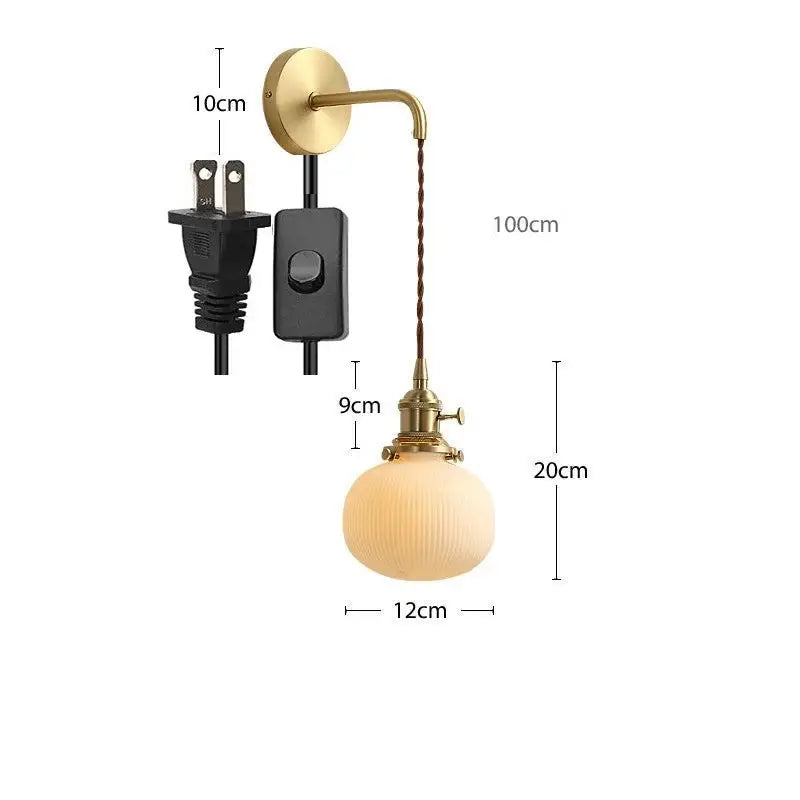 Modern gold ceramic wall lamp with ribbed shade for bedroom