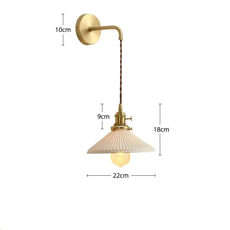 Modern gold ceramic wall lamp with ribbed shade for bedroom