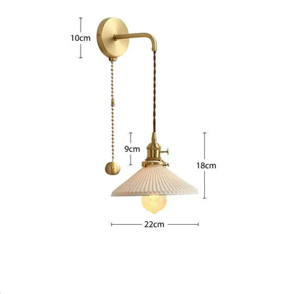 Modern gold ceramic wall lamp with ribbed shade for bedroom