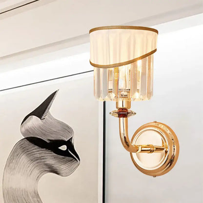 Modern gold curved arm wall light with crystal bedroom sconce