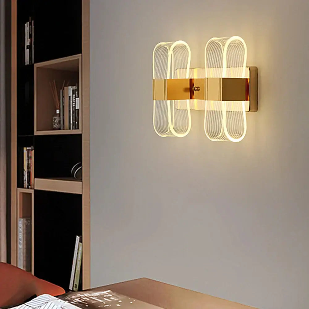 Modern gold elliptical led wall lamp for bedroom decor