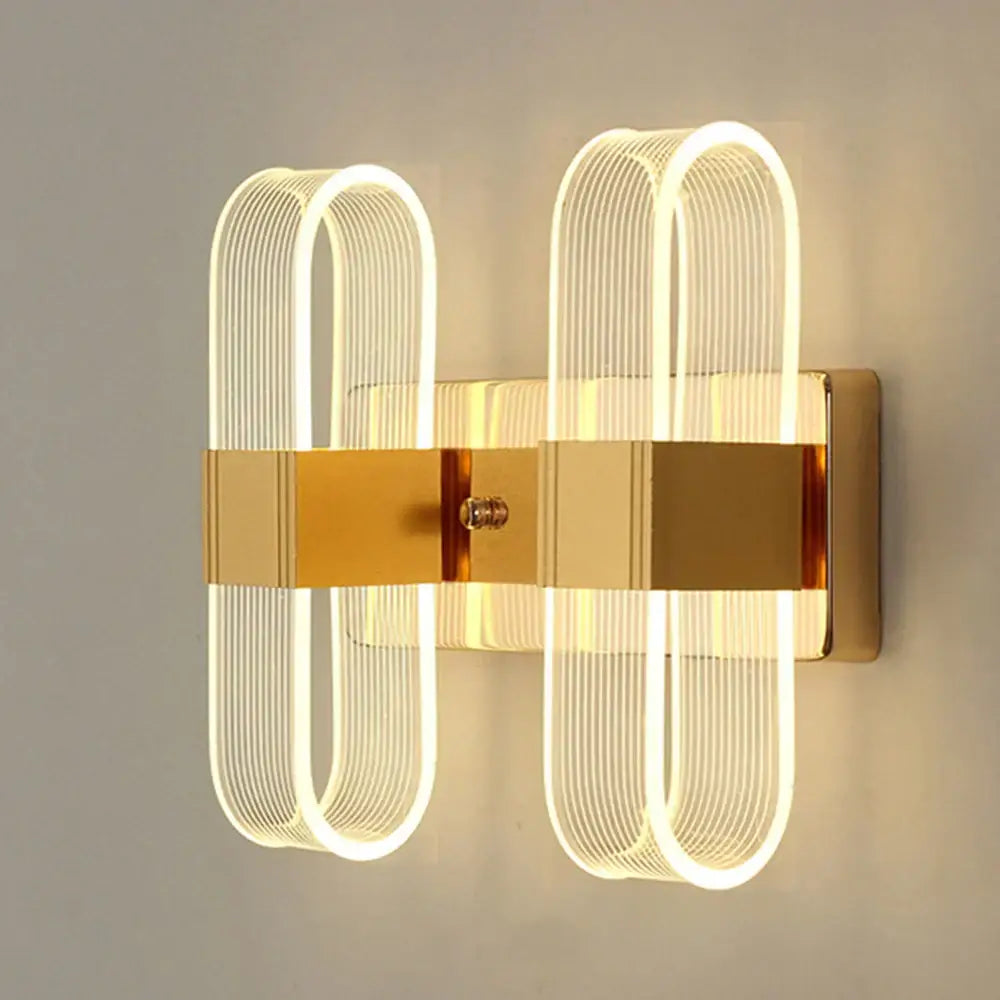 Modern gold elliptical led wall lamp for bedroom decor