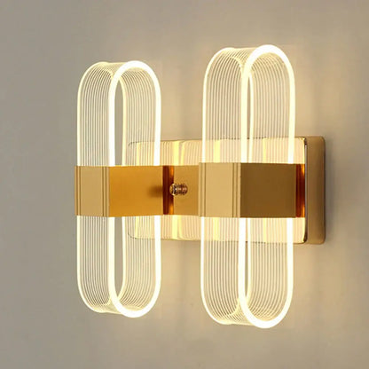 Modern gold elliptical led wall lamp for bedroom decor