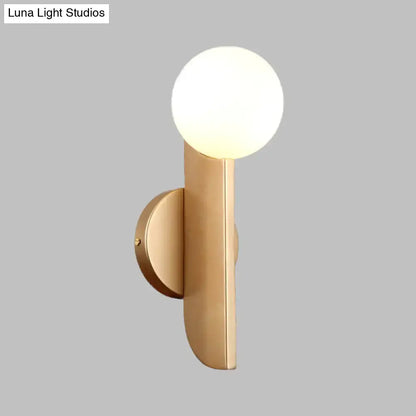 Modern gold finish wall sconce with milky glass shade bedroom light