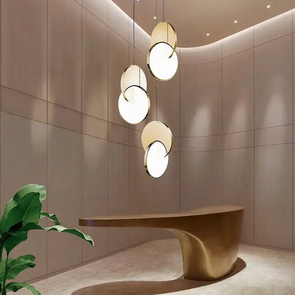 Modern gold geometric circle pendant light dining room overlapping discs