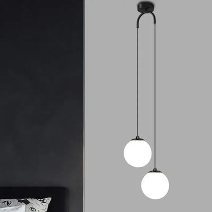 Modern gold glass ball dual head pendant light bedroom