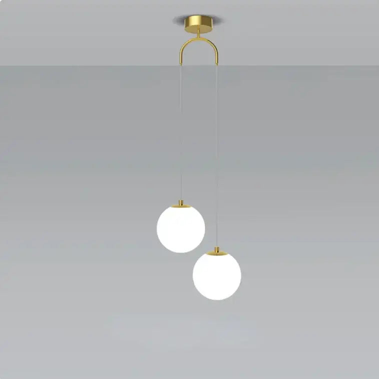 Modern gold glass ball dual head pendant light bedroom