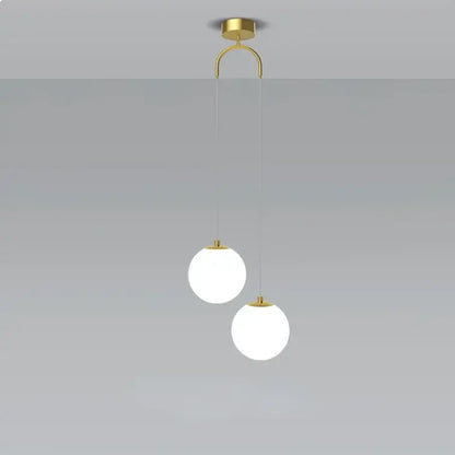 Modern gold glass ball dual head pendant light bedroom
