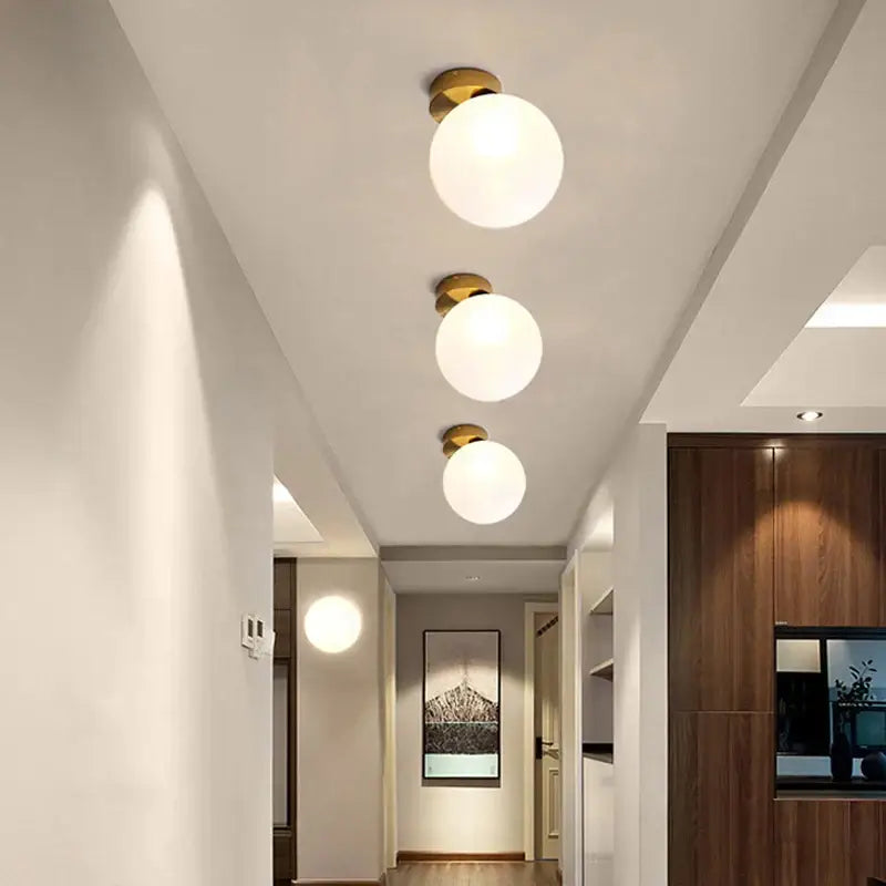 Modern gold glass ball wall lamp for bedroom with frosted globe