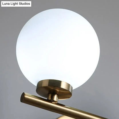 Modern gold globe shade wall sconce opal glass washroom light