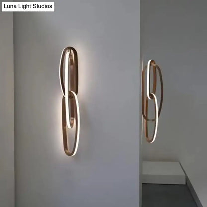 Modern gold interlocking oval led wall lamp living room