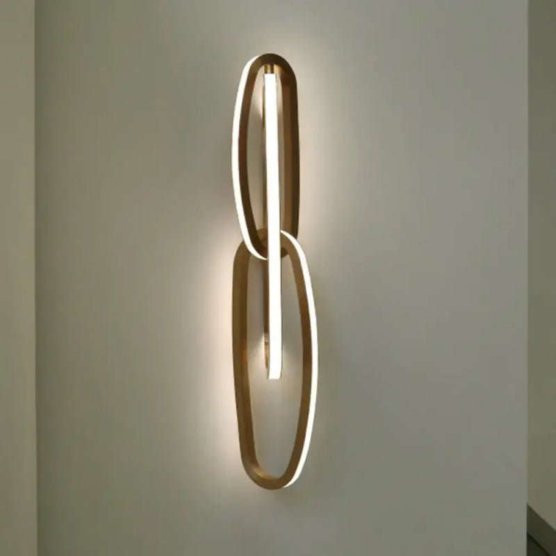 Modern gold interlocking oval led wall lamp living room