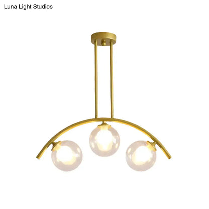 Modern gold island pendant with clear white shade for kitchens