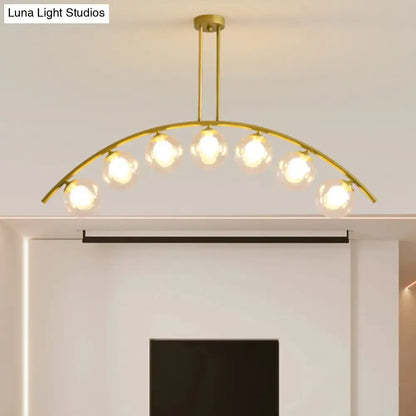 Modern gold island pendant with clear white shade for kitchens