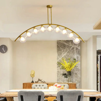 Modern gold island pendant with clear white shade for kitchens