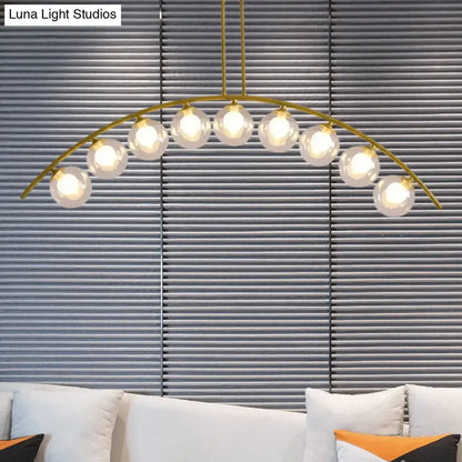 Modern gold island pendant with clear white shade for kitchens