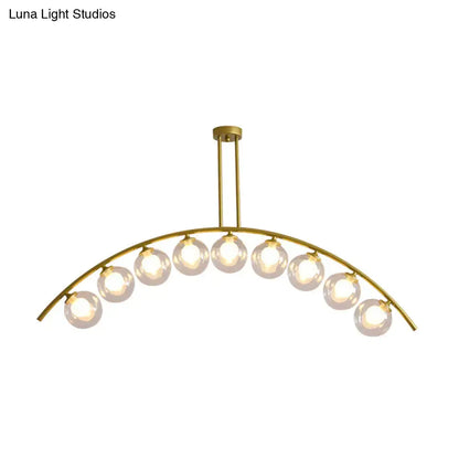 Modern gold island pendant with clear white shade for kitchens