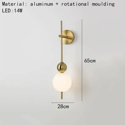 Modern gold led wall sconce with frosted glass spheres for bedroom