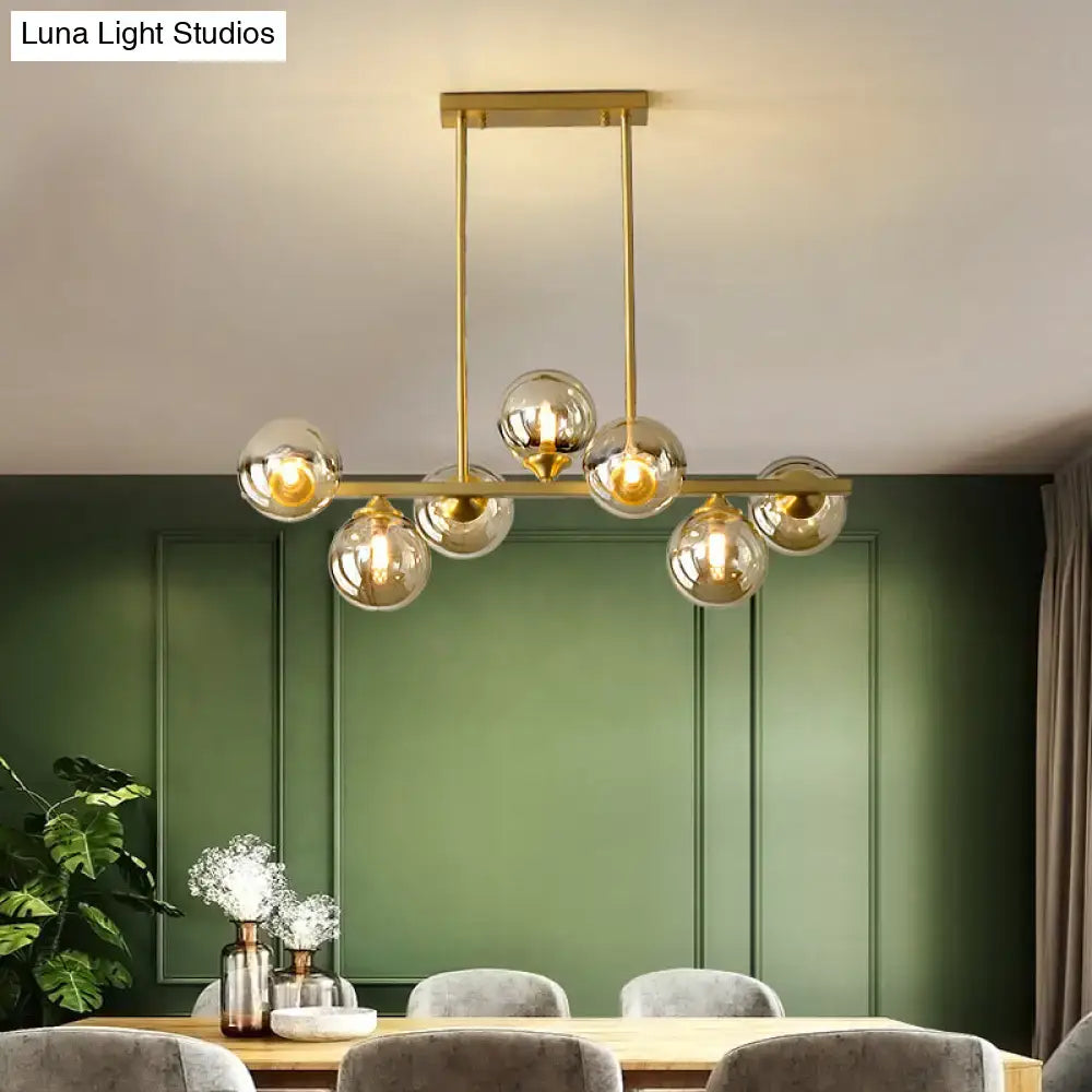 Modern gold metal amber glass island light for dining room