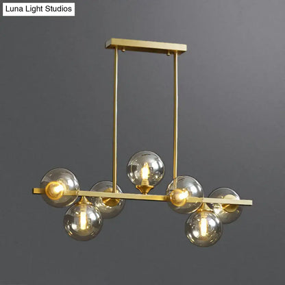 Modern gold metal amber glass island light for dining room