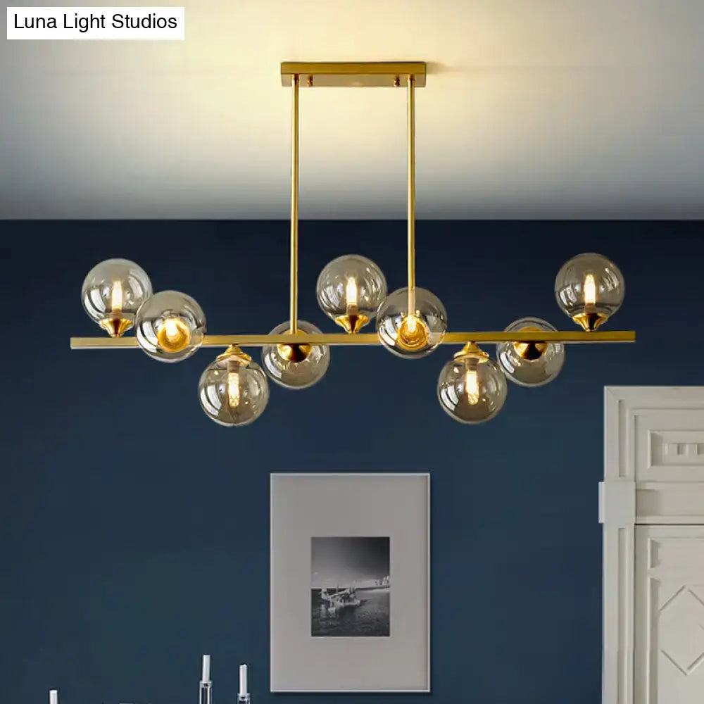 Modern gold metal amber glass island light for dining room