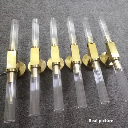 Modern gold metal and glass wall sconce light for bathroom