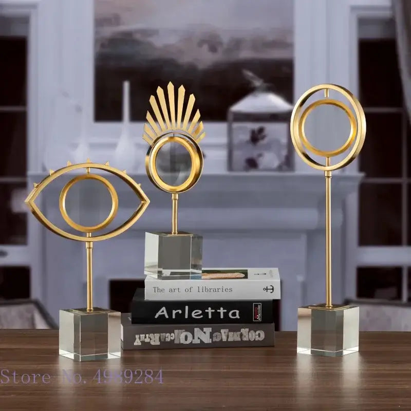 Modern gold metal eye magnifying glass with glass base living room decor